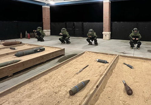 EOD candidates going through bomb suit test.