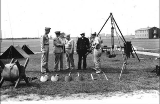 The Bomb Disposal School, established in 1942 at Aberdeen Proving Ground under the leadership of Colonel Thomas J. Kane, trained 219 seven-man teams in WWII.