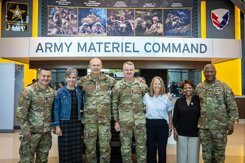 (From left) Sergeant Major of the Army Michael Weimer, Patty George, Chief of Staff of the Army Randy George, Army Materiel Command Deputy Commanding General and Acting Commander Lt. Gen. Chris Mohan, Cindy Mohan, Shaunette Sellers and AMC CSM Jimmy Sellers pose for a group photo at the AMC headquarters. (U.S. Army photo by Mike Lee) (Joseph M. Lee).